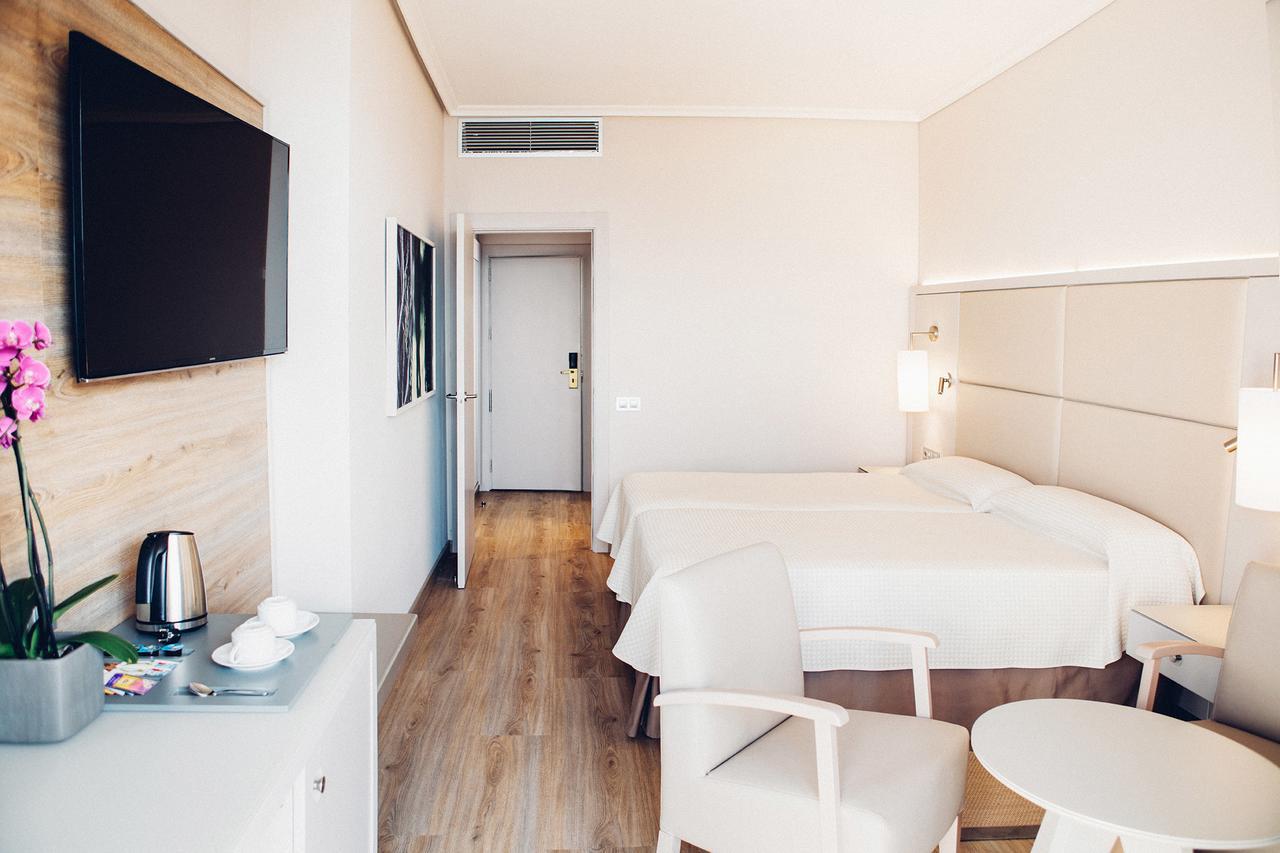 Double or Twin Room with Side Sea View,967402507:JPEG